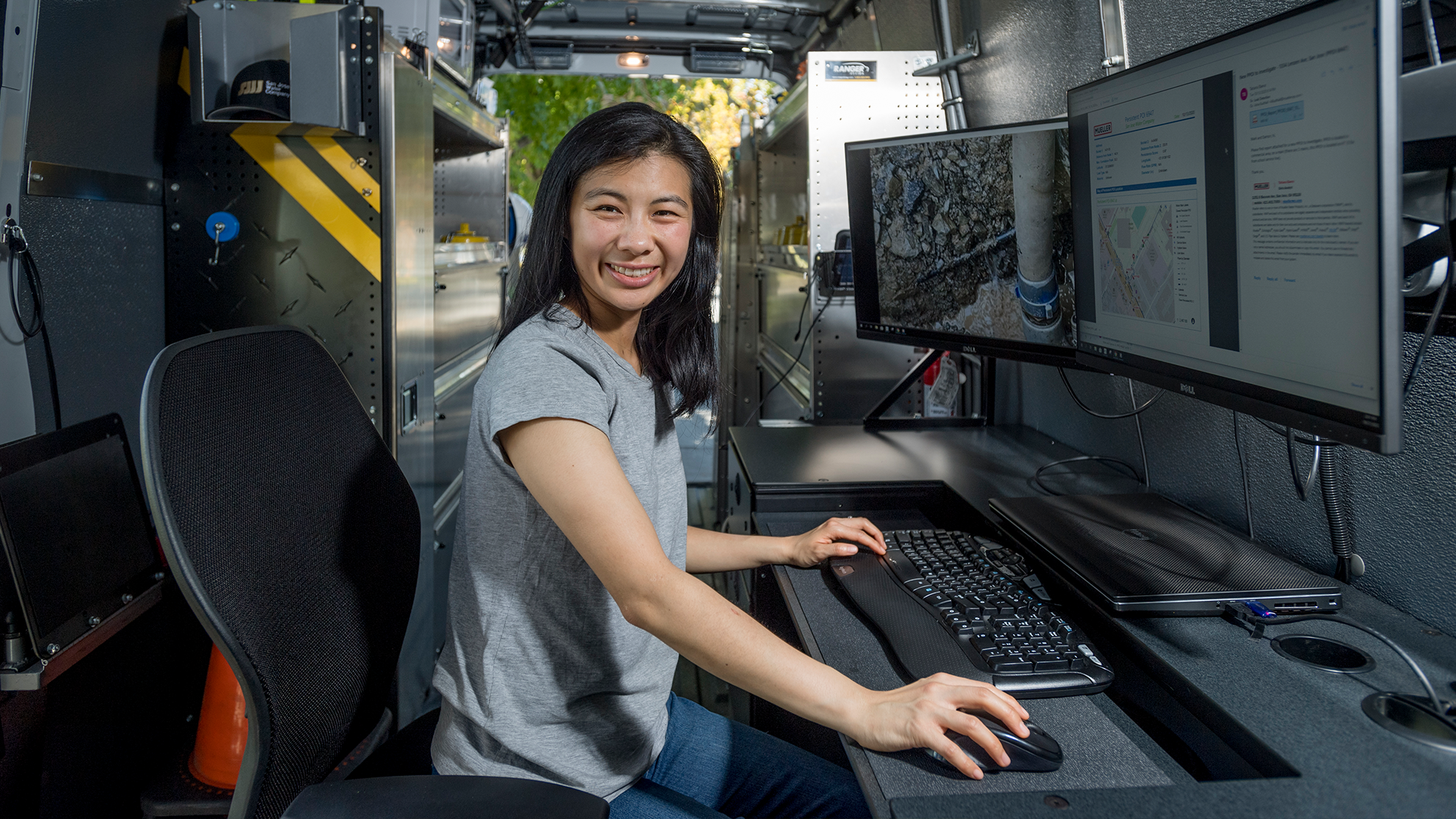 a San Jose Water employee in a work truck using computer software in detecting leaks