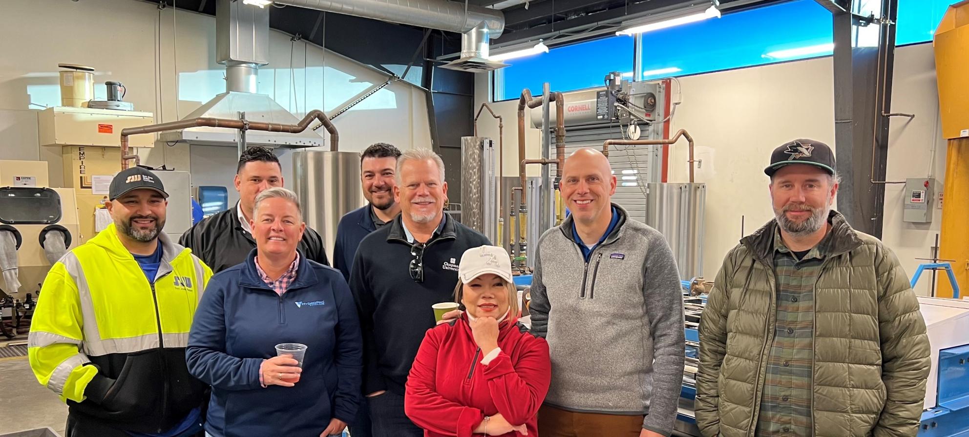 Anh at a networking event with fellow SJW staff, colleagues from Soquel Water District, and smart meter vendors.