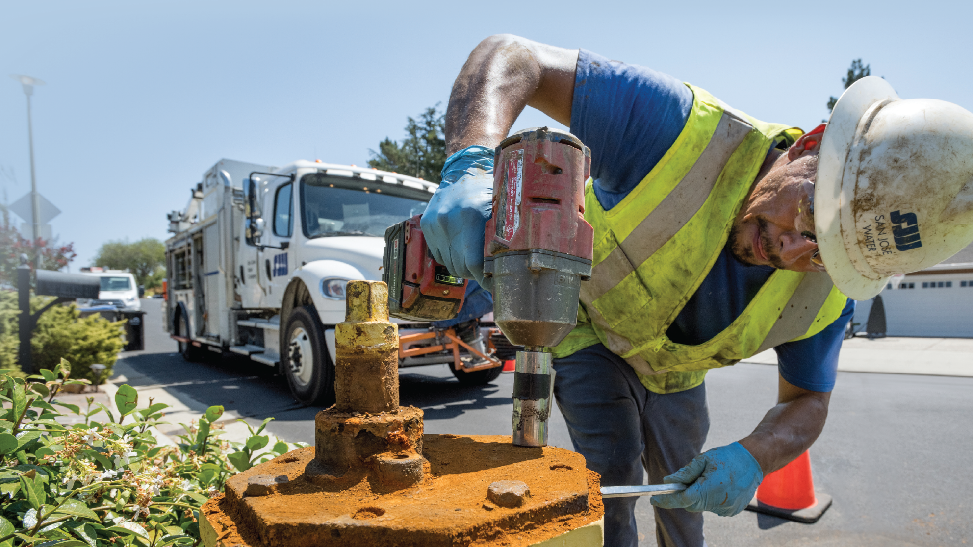 A San Jose Water Employee working on a hydrant