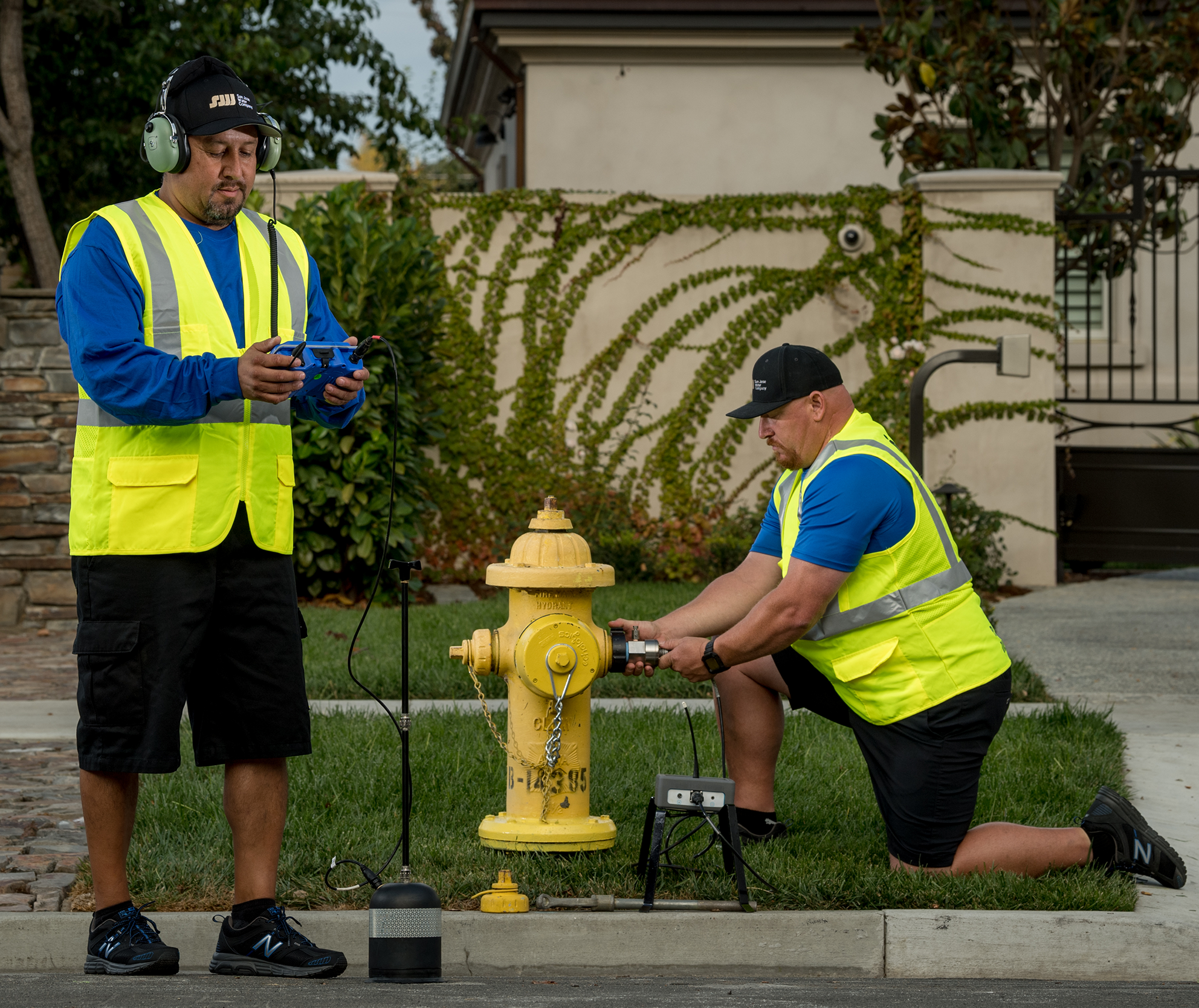 San Jose Water employees working on a fire hydrant