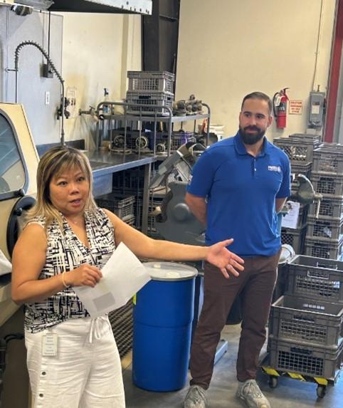 person talking while holding a sheet of paper