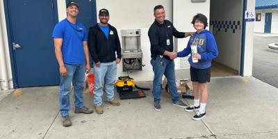 people around a water fountain