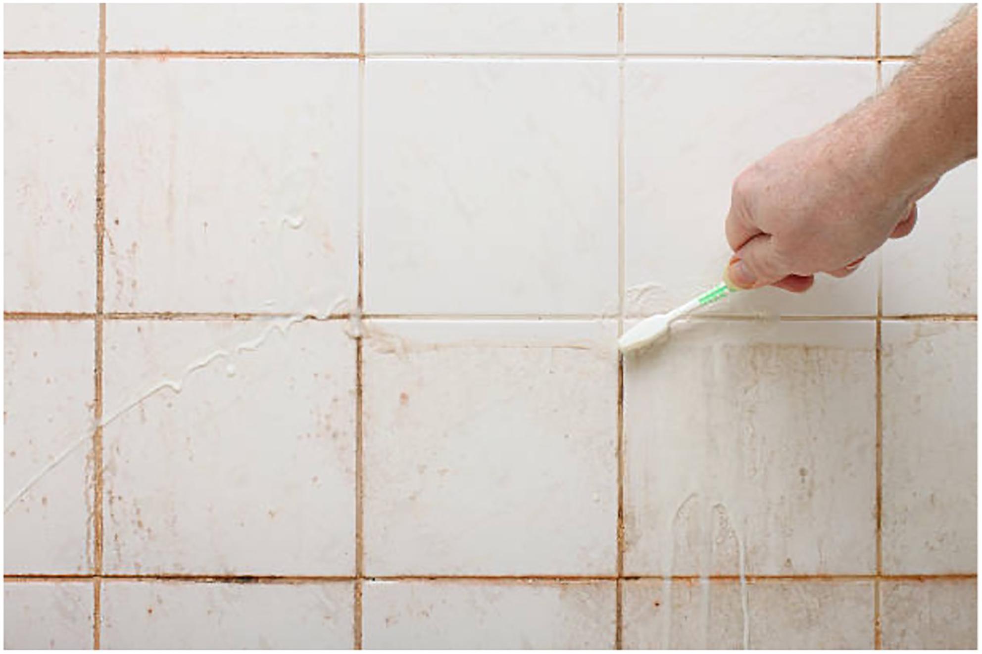pink stains on shower tiles. 