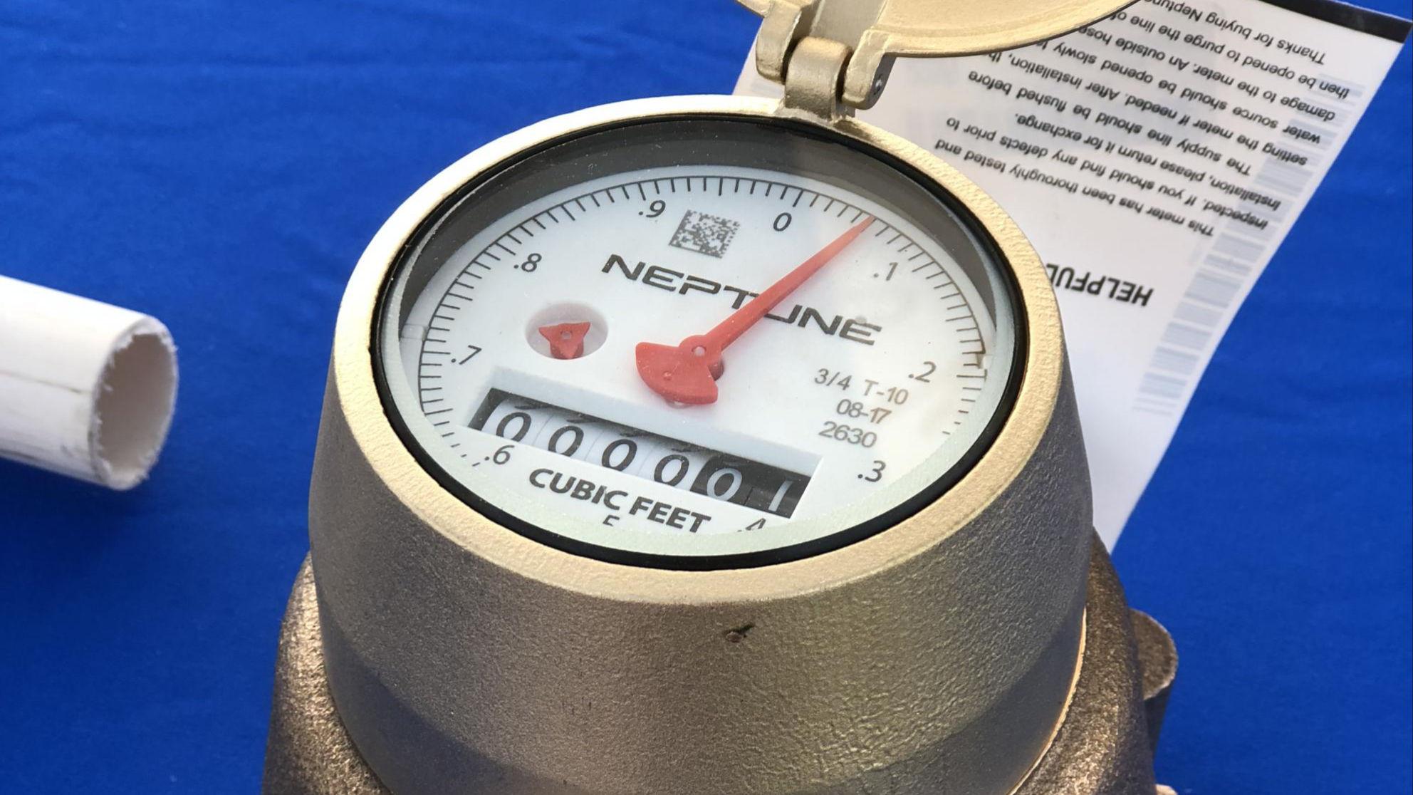 Closeup of a new water meter on a table