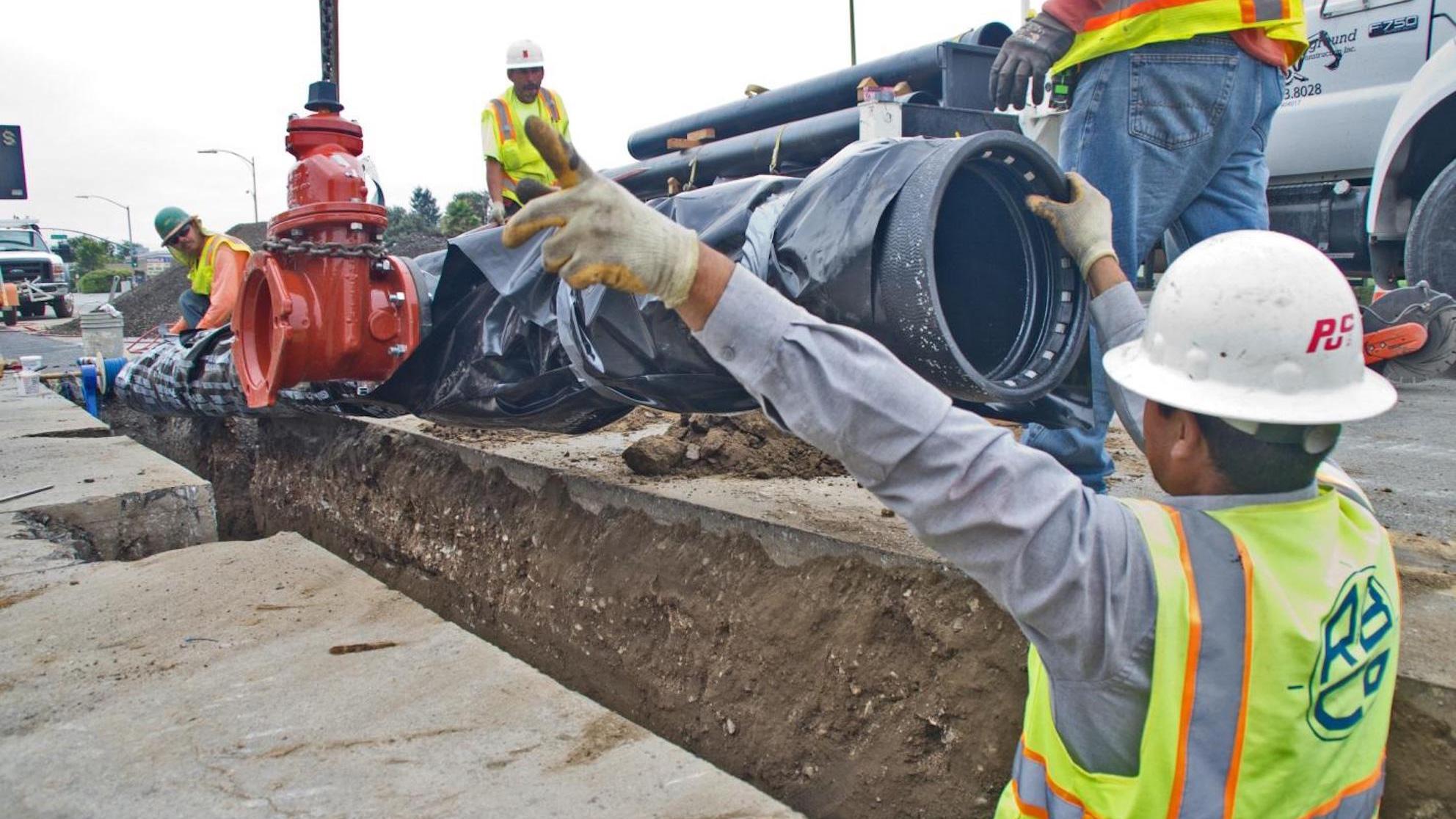 SJWsystemimprovements-pipe16x9.jpg SJW employees updating water pipe