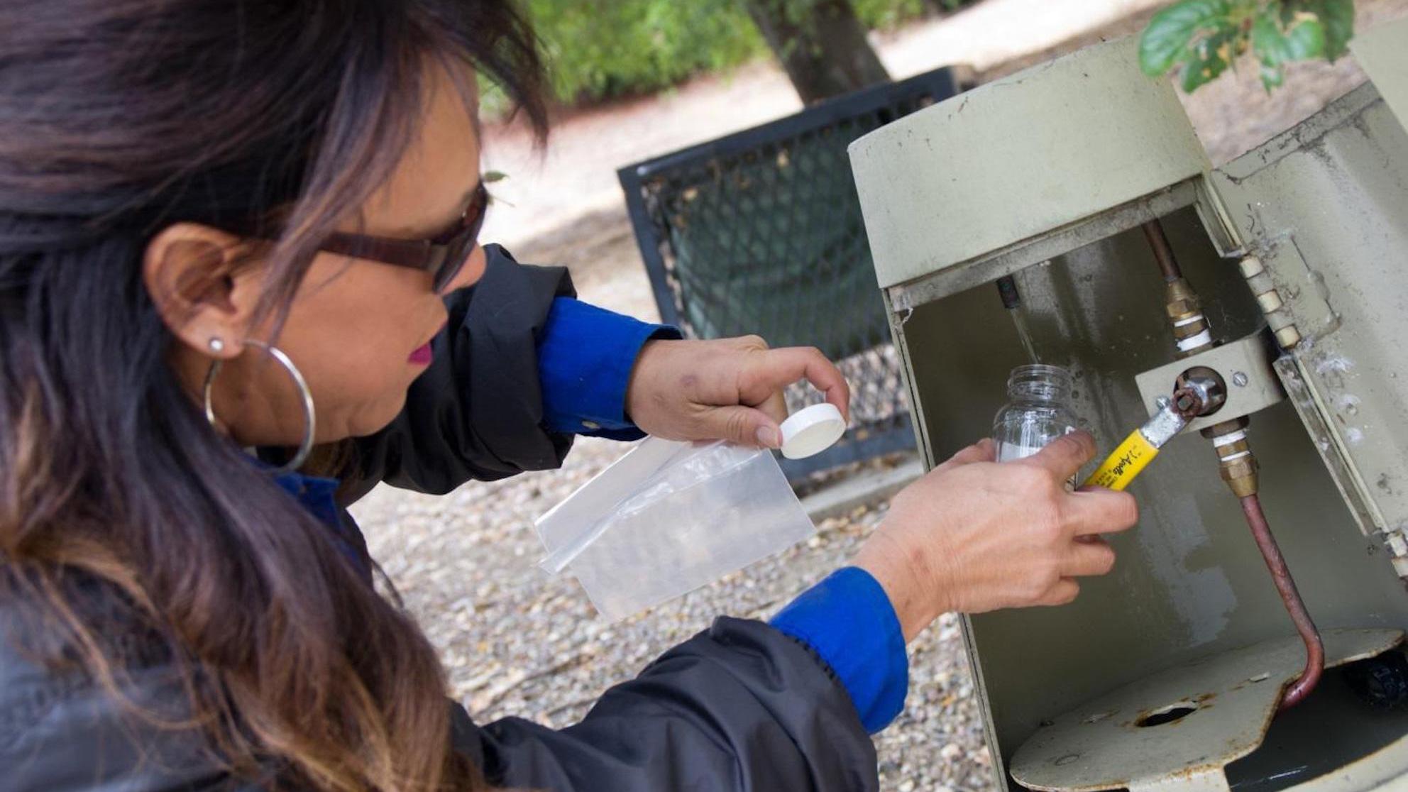 Woman testing water