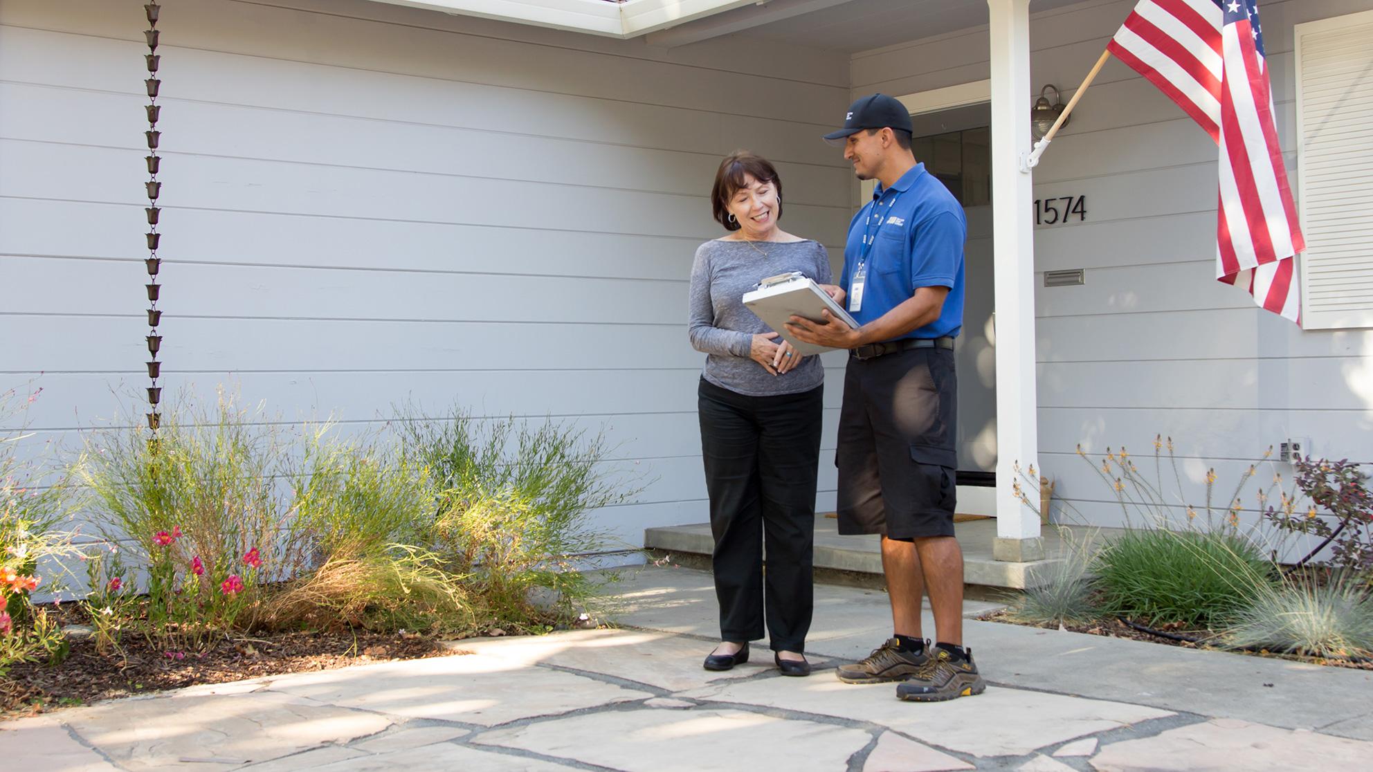 field-visit-2.jpg San Jose Water Worker and Customer talk outside a home