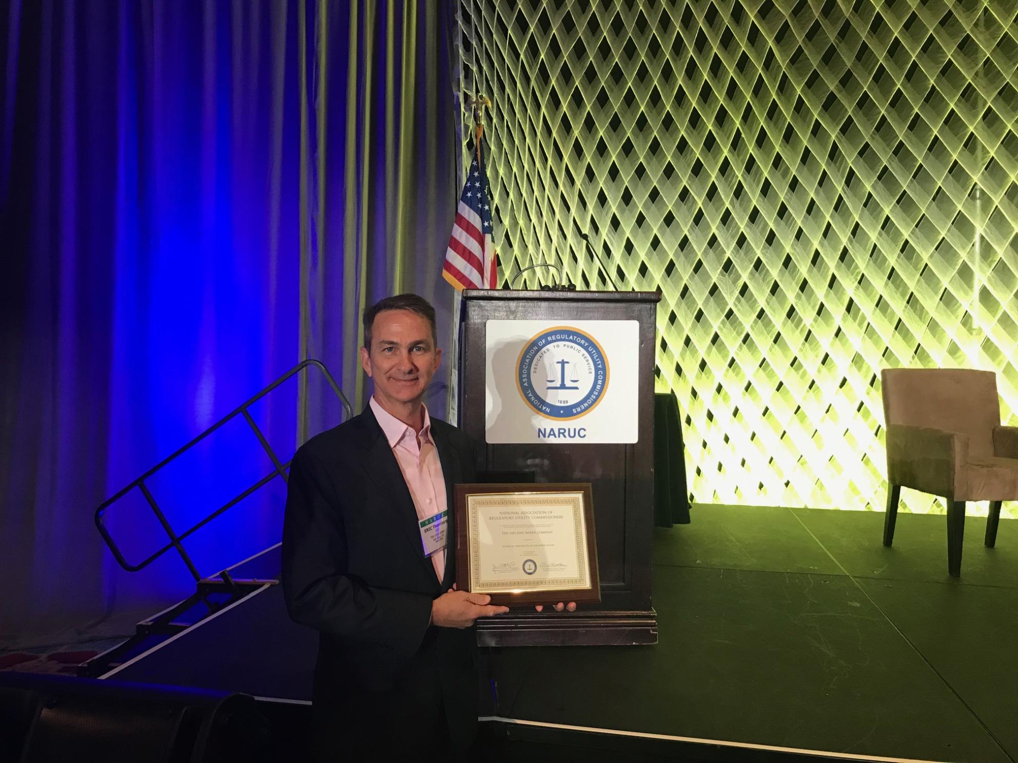 San Jose Water CEO Eric W. Thornburg holding NARUC Award