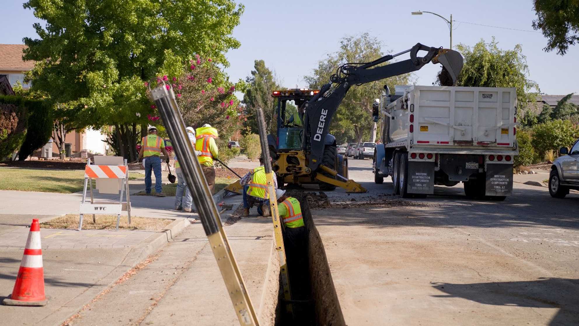 SJW workers installing a new residential waterline