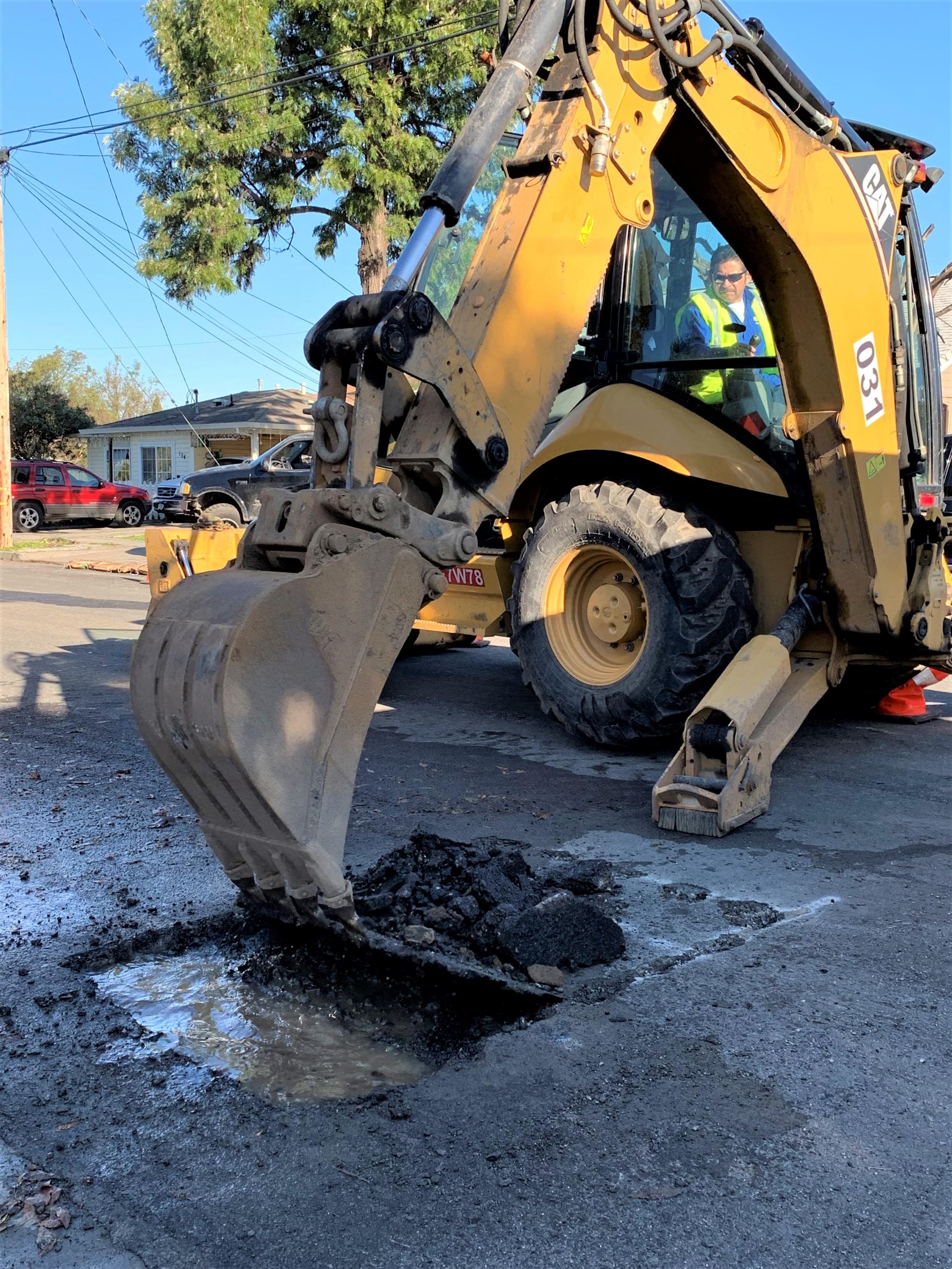 Johnny and backhoe.jpg Backhoe