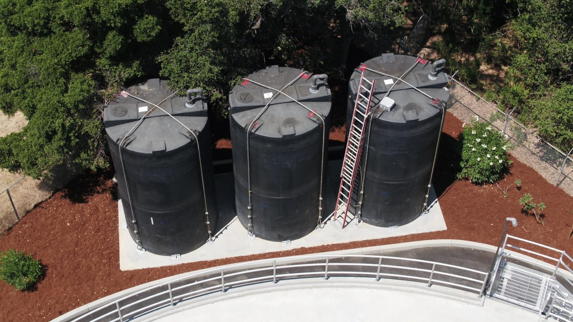 Aerial view of three temporary tanks during construction of main Pike Tank.v2.jpg Temporary