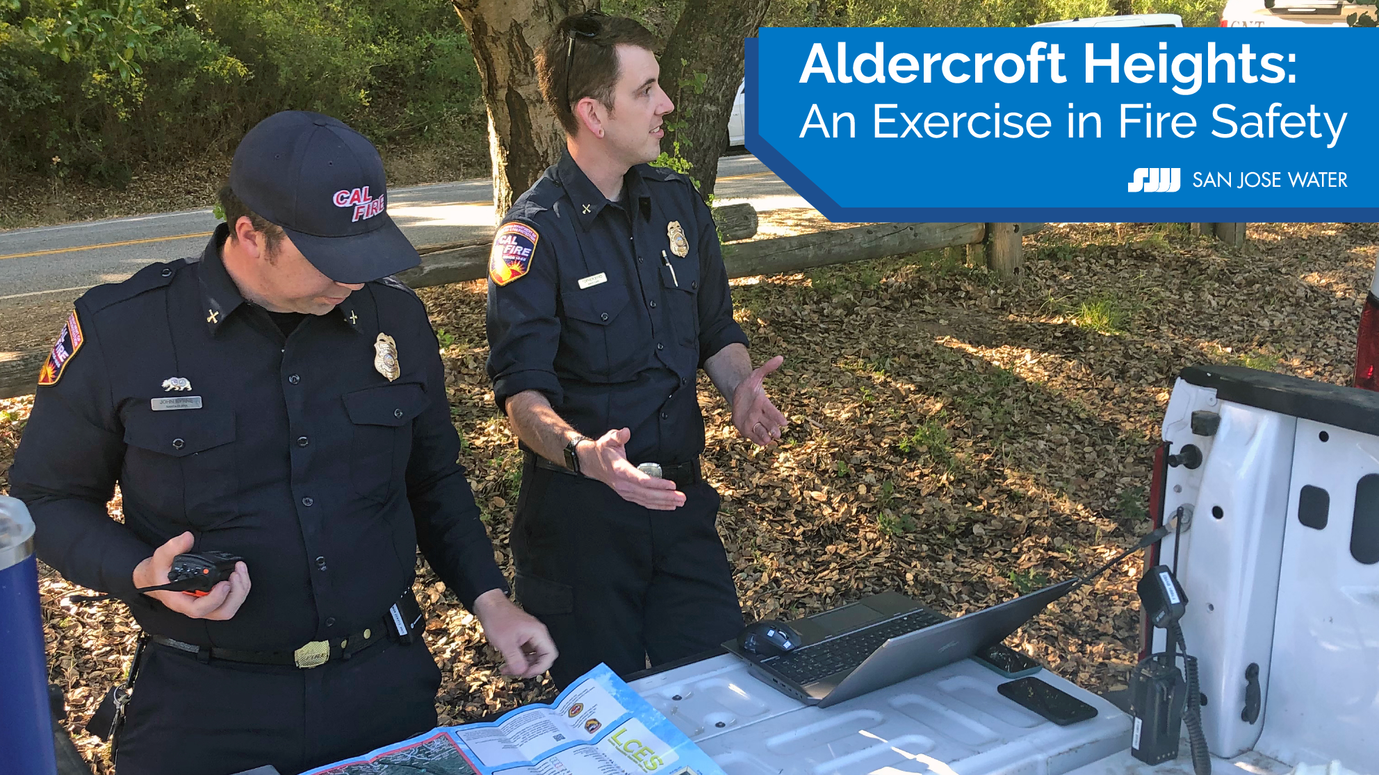 Police officers looking at map