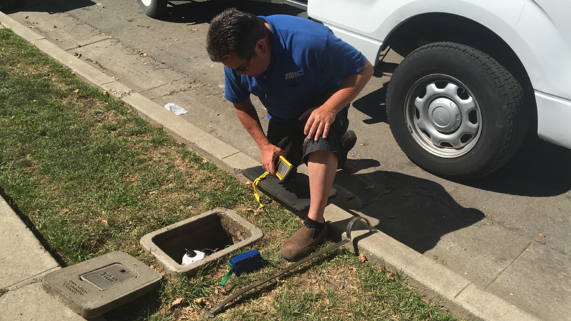 SJW crew inspecting an advanced water meter