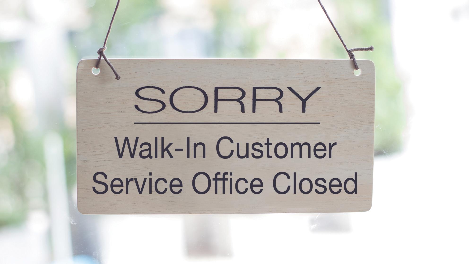 sign says sorry walk-in customer service office closed