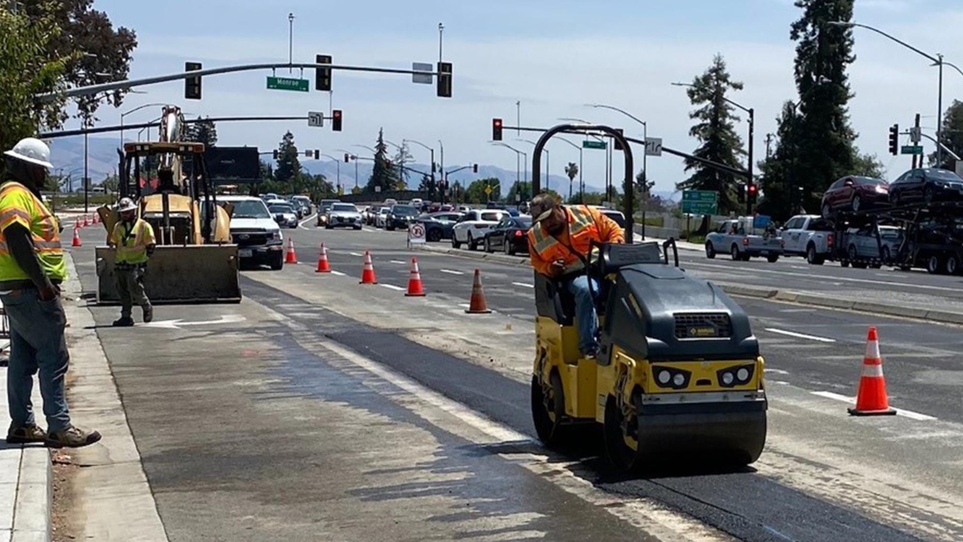 Picture of steam roller paving street