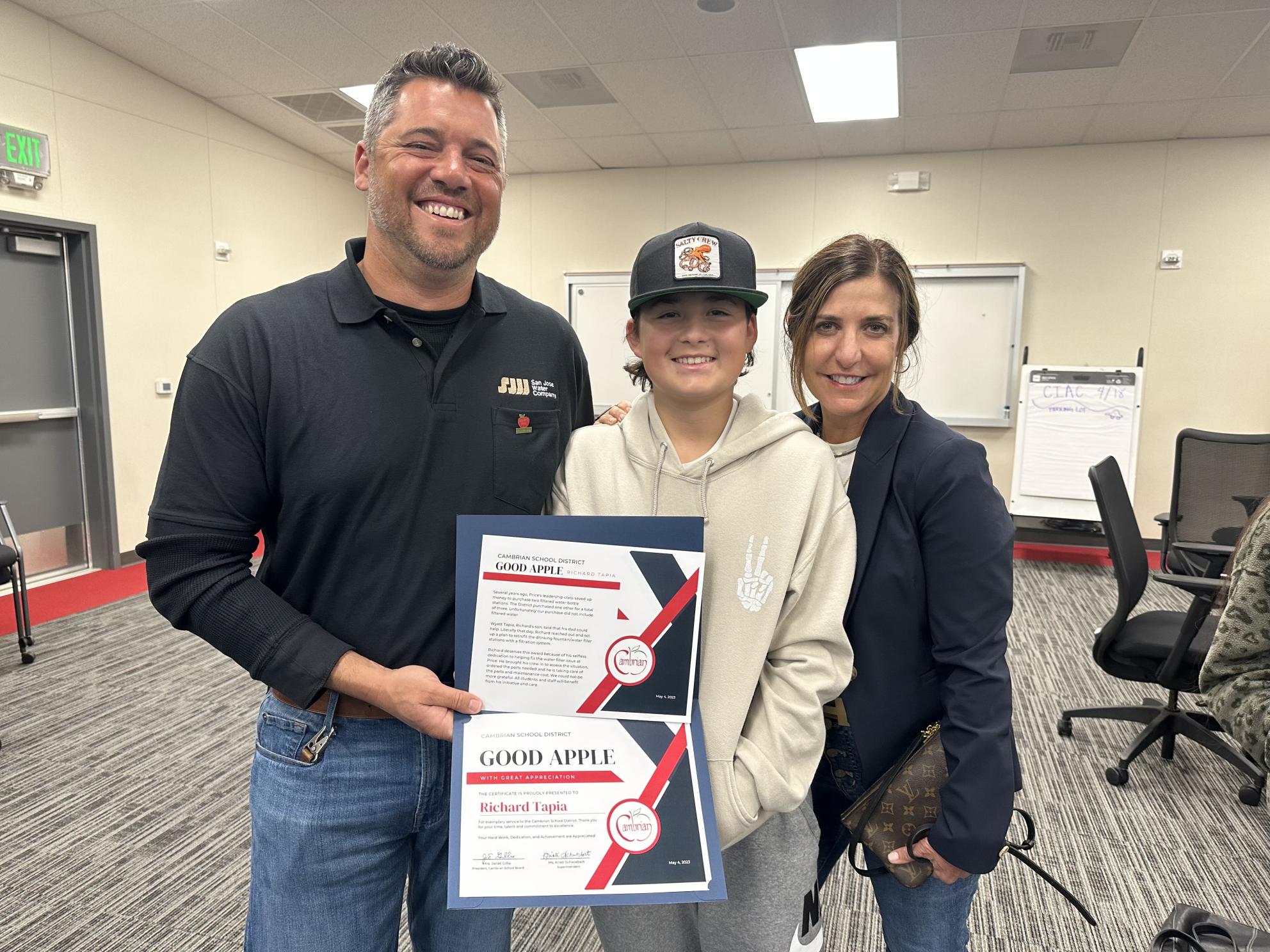 Richard Tapia with son receiving Shining Apple award