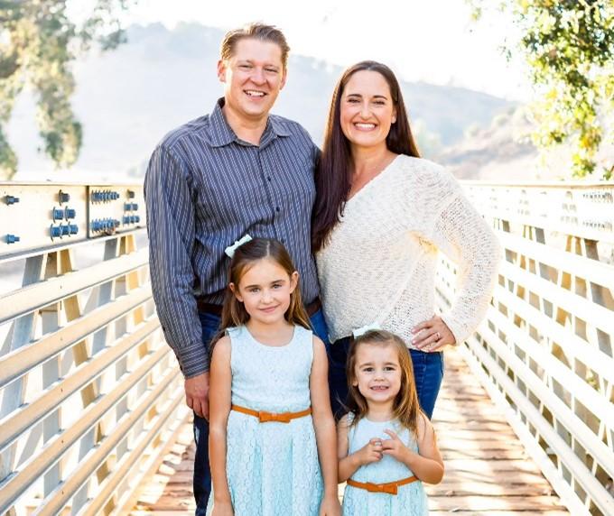 Brandon Stieber with wife and two daughters