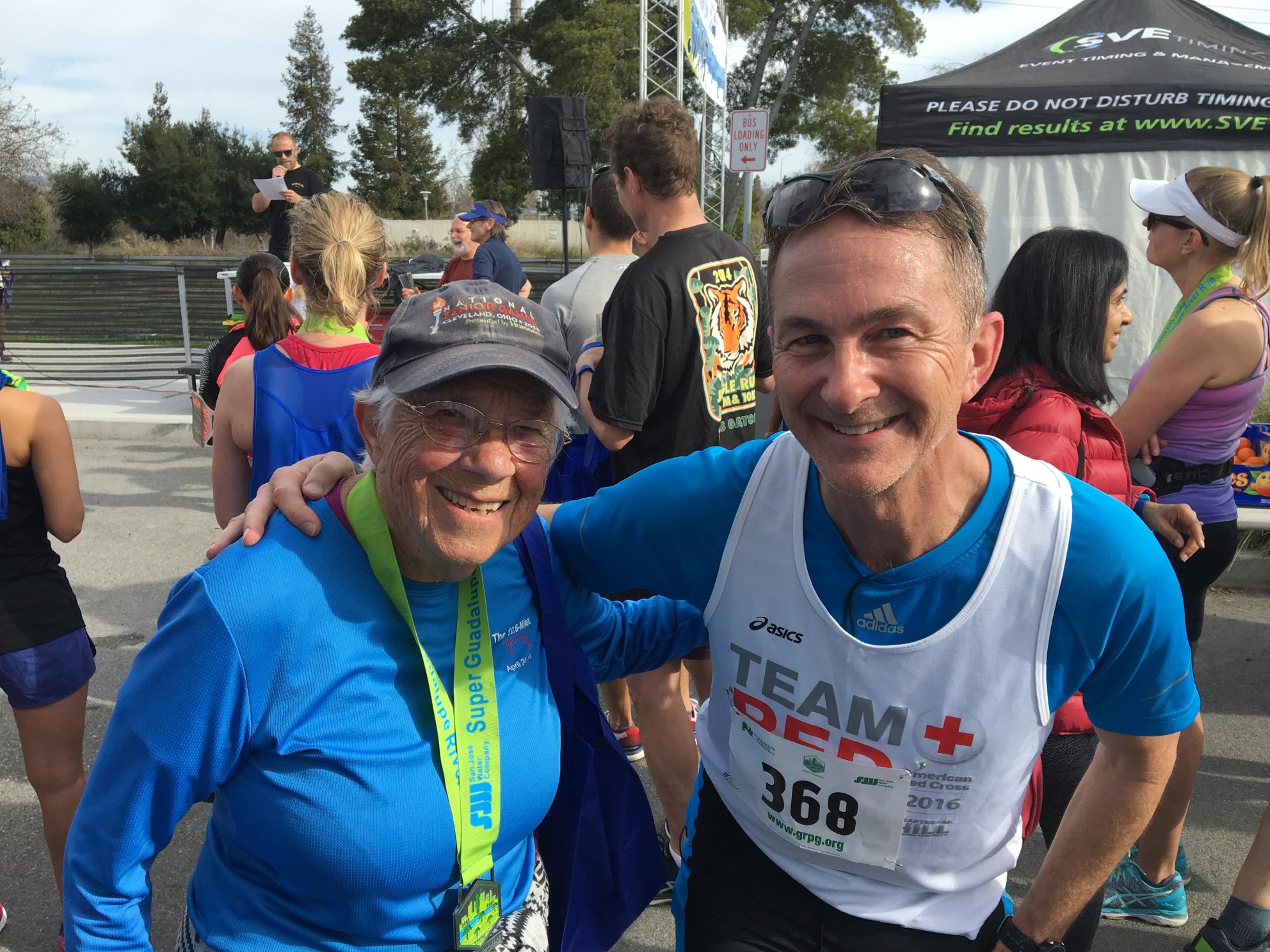 CEO Eric Thornburg standing with Phyllis, a 93 year old runner