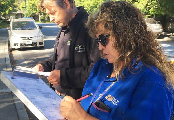 Small-Biz-Water-Audit1.jpg SJW employees jotting down notes on the field