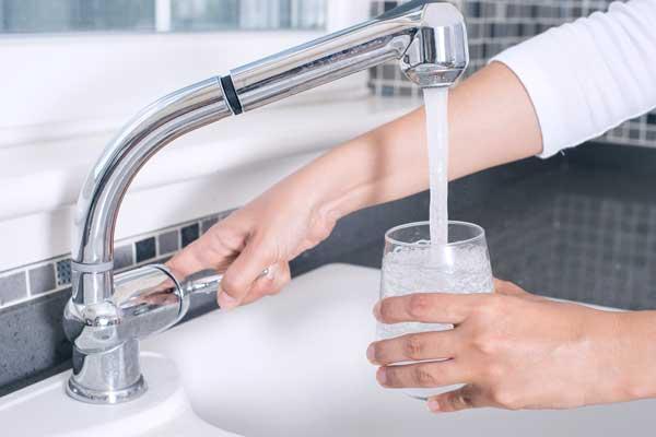 Getting water from the kitchen tap