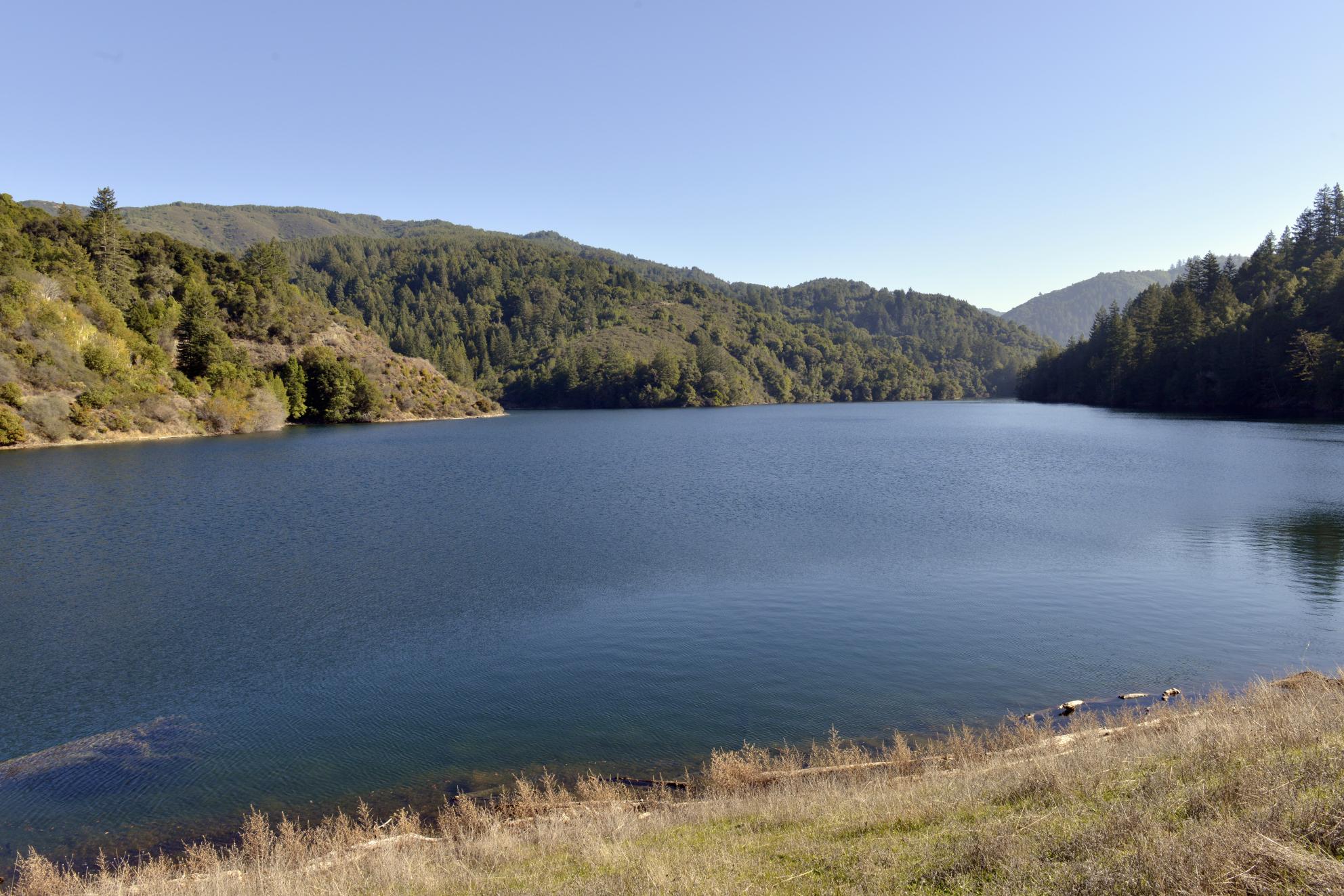 Water in lake with green hills